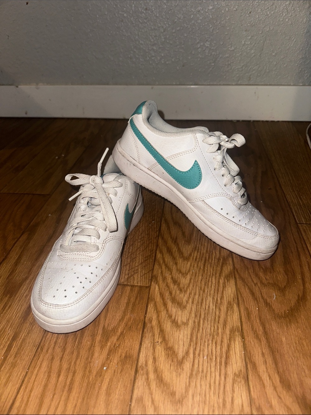 Nike White Low-Top Sneakers with Teal Swoosh
